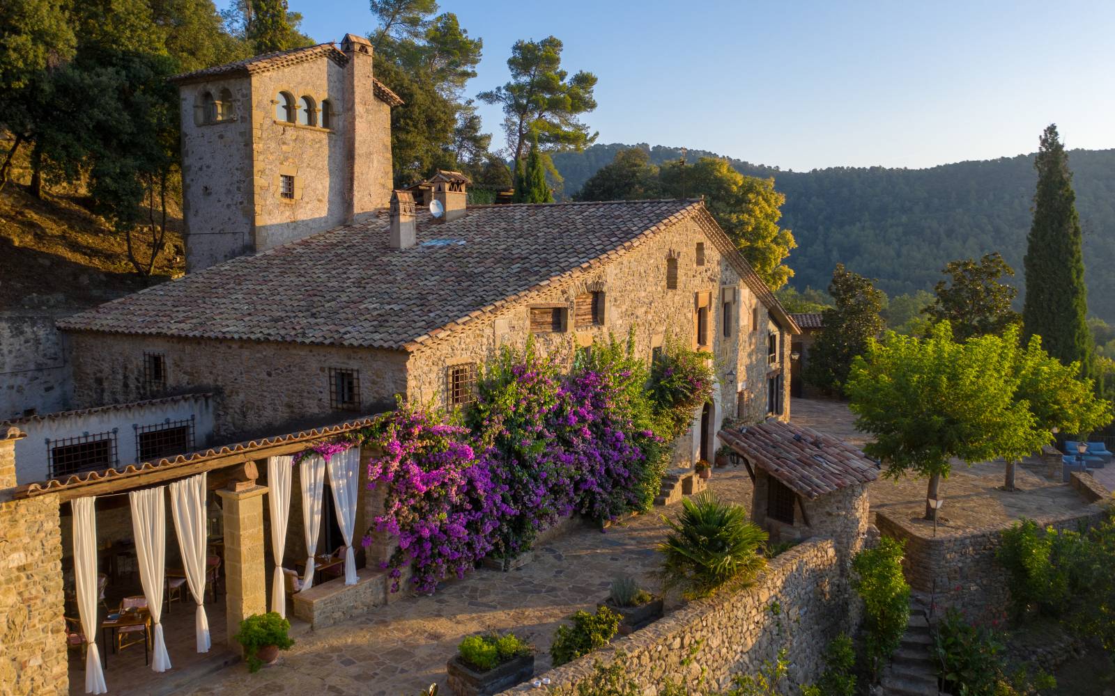 Masía Can Pou in Girona Rural stone house garden