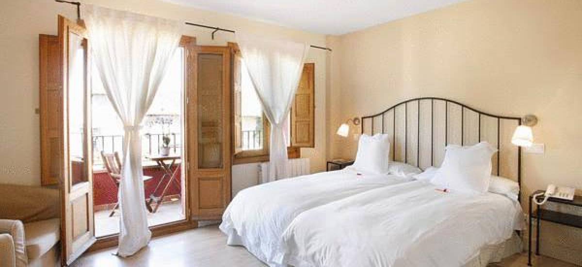 Rusticae Madrid Hotel Rincón de Traspalacio rural bedroom